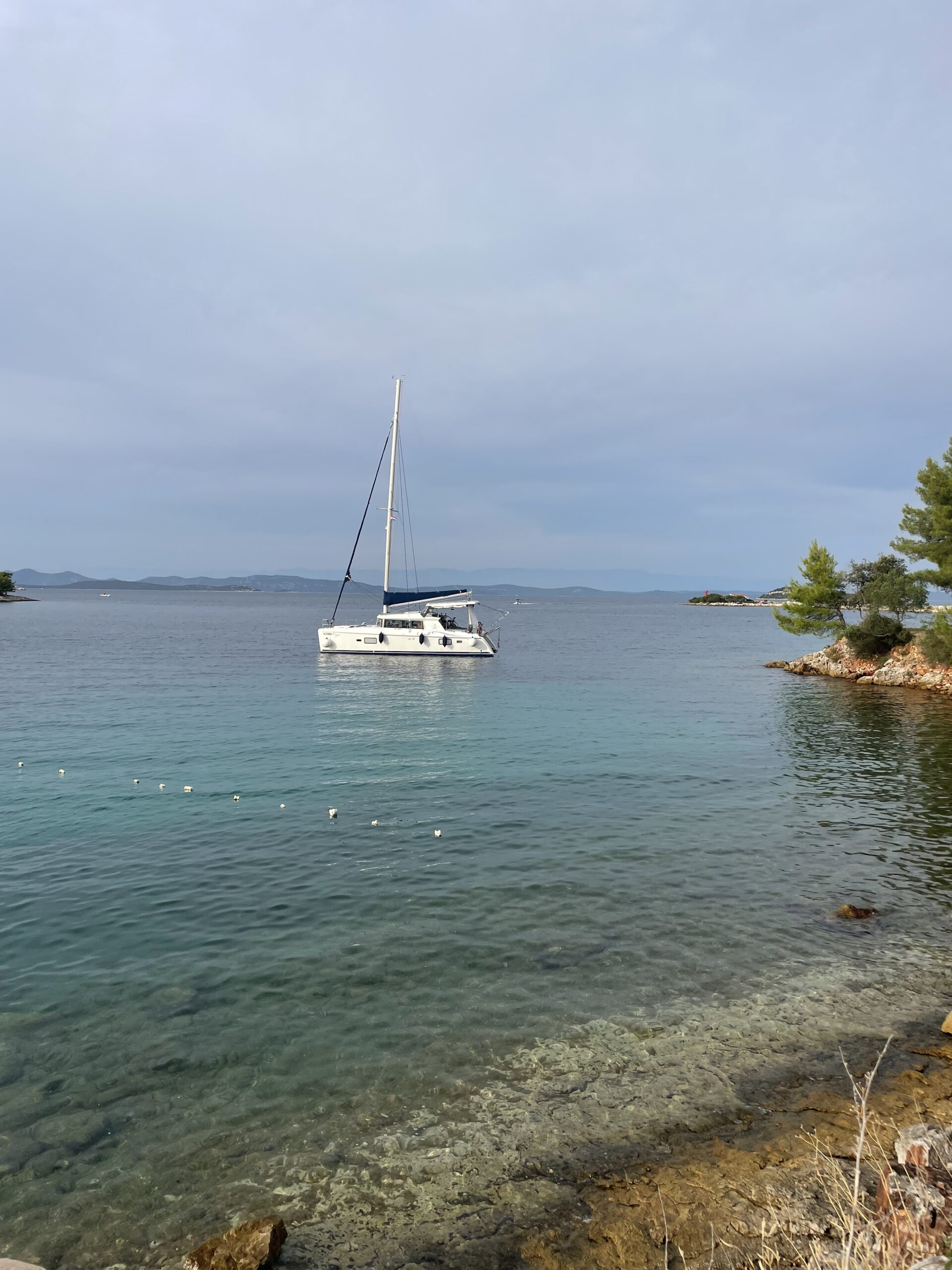 Catamaran in a quiet bay – the beginning of a new life at sea
