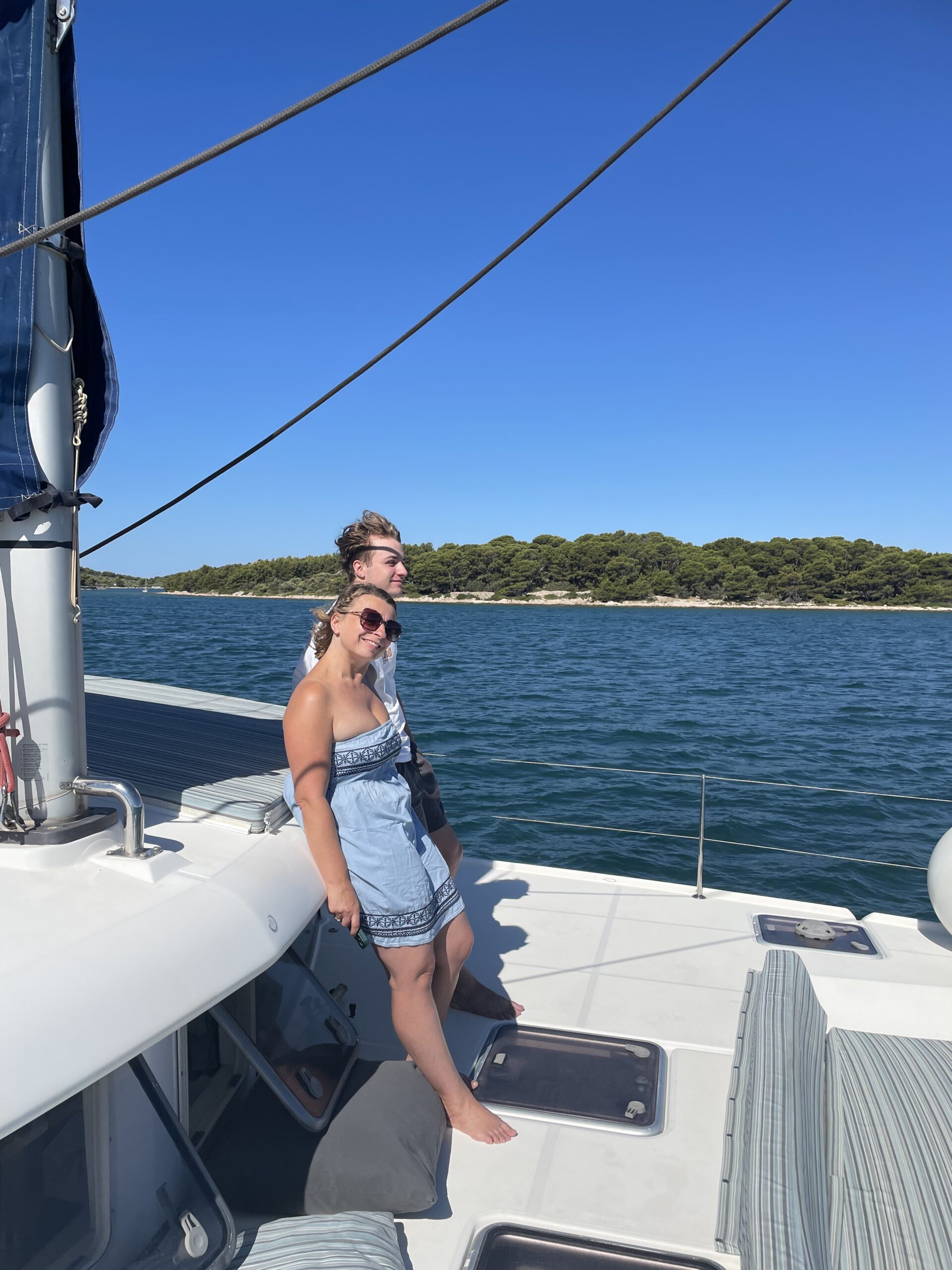 Guest relaxing on board the catamaran Eragon
